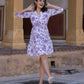 Orni Fashion Pruple And White Printed Fit And Flred Dress